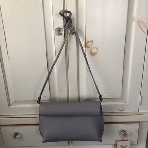 Urban Outfitter Roll Clutch Crossbody Bag